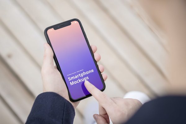 户外场景男生手持iPhone手机设计样机 iphone-mockup-outdoor-scenes